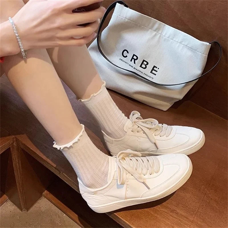 Versatile Breathable Classic Solid Color Round Toe Soft Leather White Flat Sneakers