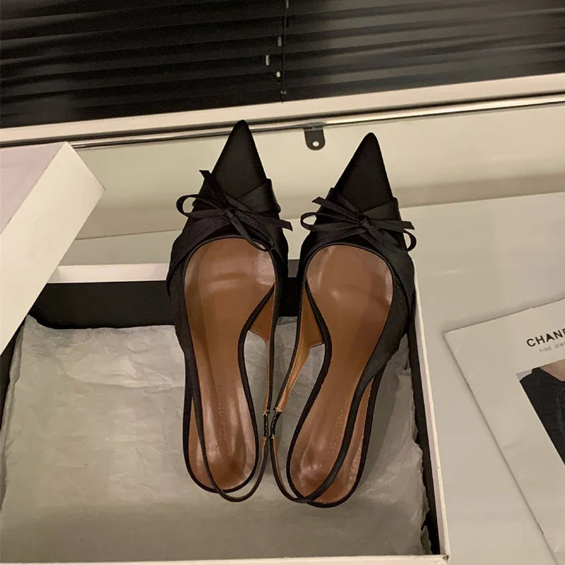 Bowktie pointed toe slingbacks low thin heel