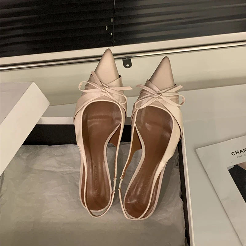 Bowktie pointed toe slingbacks low thin heel