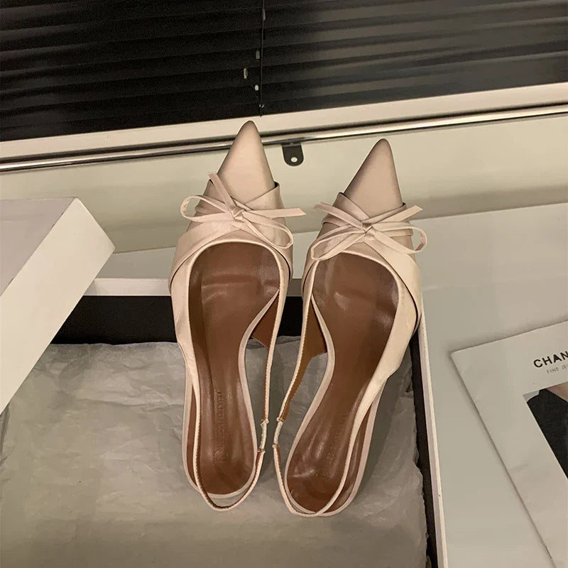 Bowktie pointed toe slingbacks low thin heel